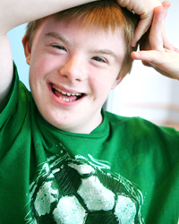 An image of a boy smiling.